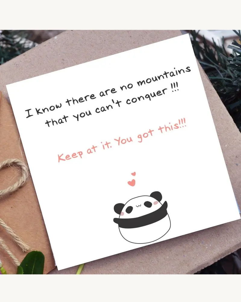 A white greeting card with the text "I know there are no mountains that you can't conquer !!! Keep a