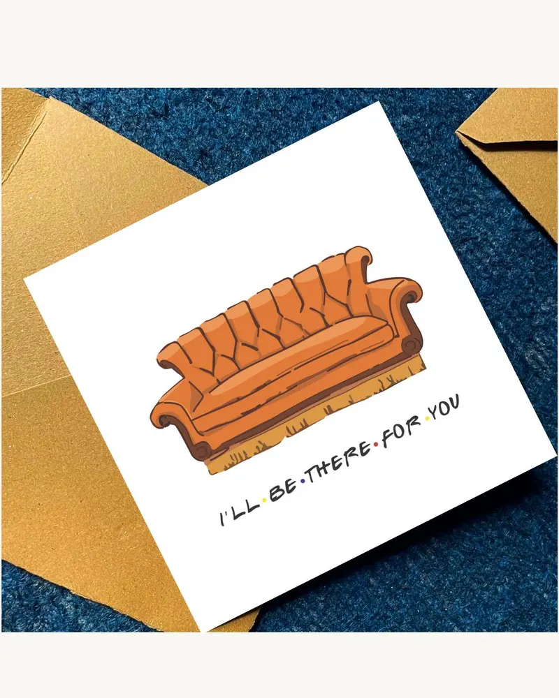 A square greeting card featuring a hand-drawn illustration of an orange tufted sofa. Below the sofa,